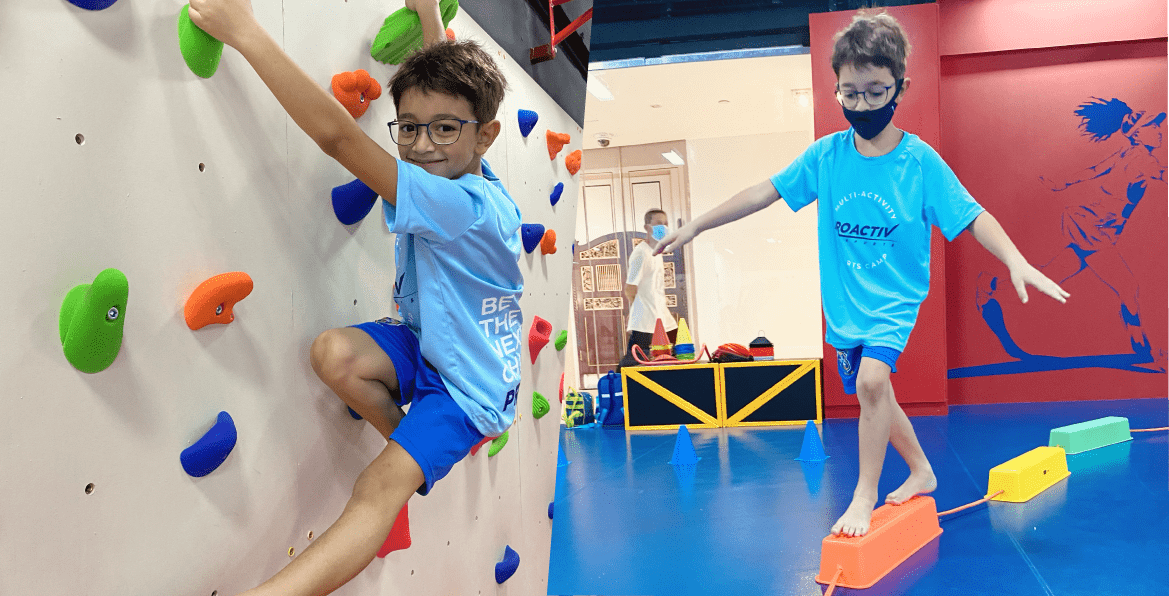 Close-up of a child's sneakers as they jump over a series of bright yellow agility hurdles.