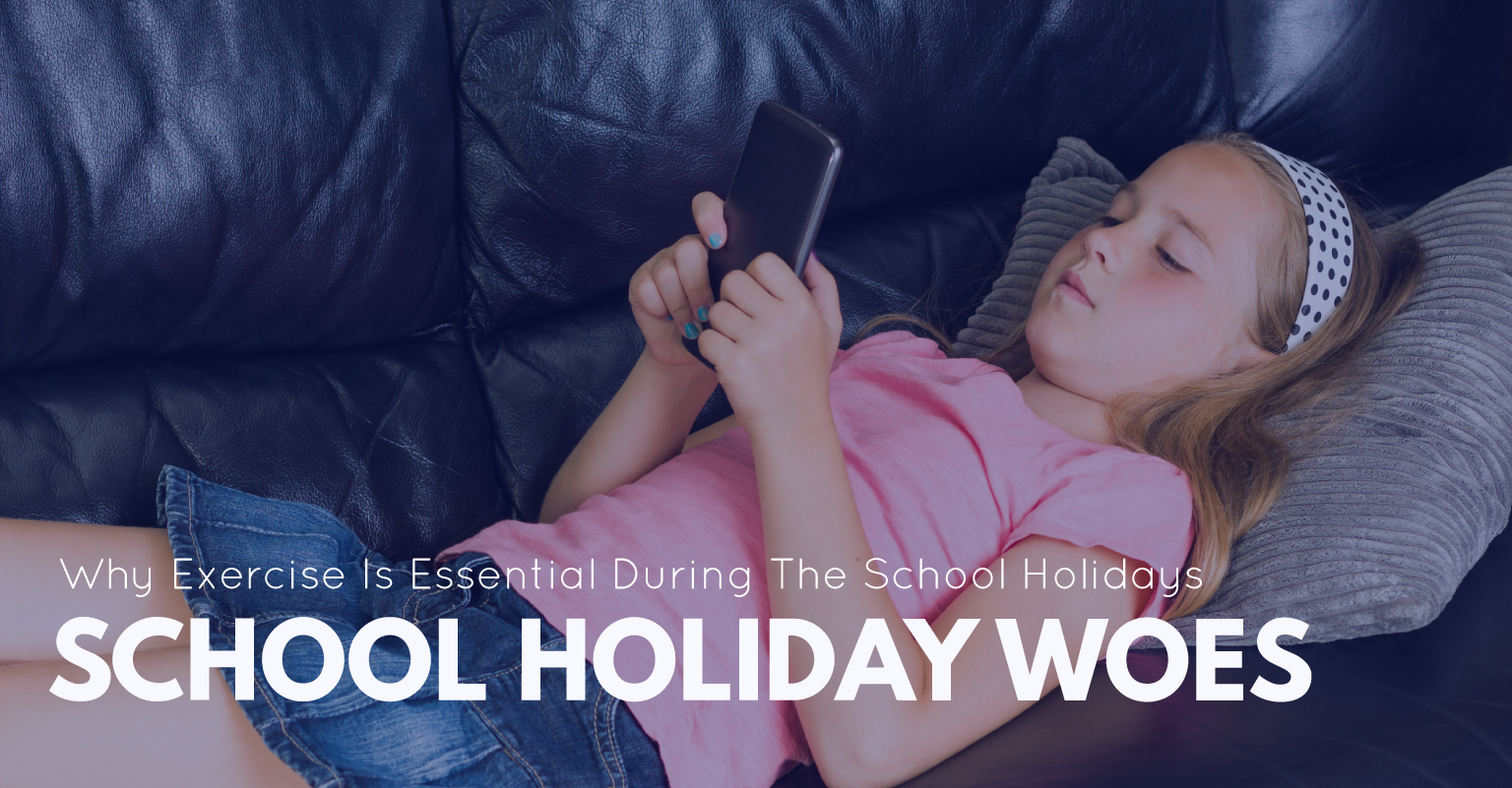 A frustrated parent looking at a calendar while their energetic child does a cartwheel in the background.